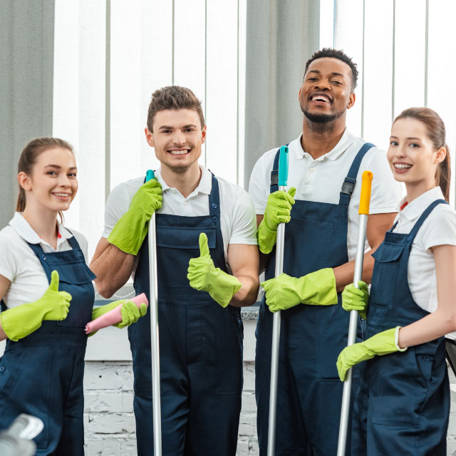 Professional cleaning team representing Cleanifiq's vision